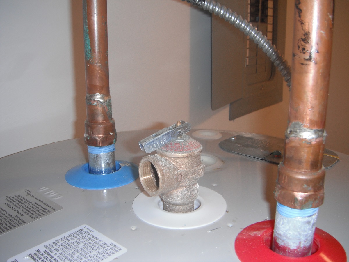 No extension on the T.P.R valve on the water heater. "Lansing Home Inspection Photo"