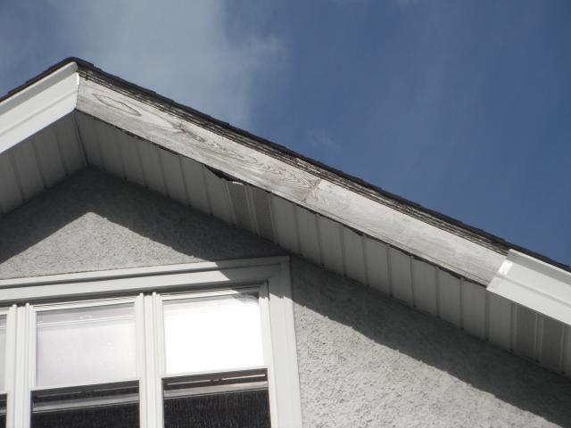 Aluminum trim is missing on gable. "River Forest Home Inspection Photo"