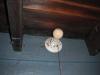 Pull chain light fixture made for the interior. Safety hazard. "Cicero Home Inspection Photo"