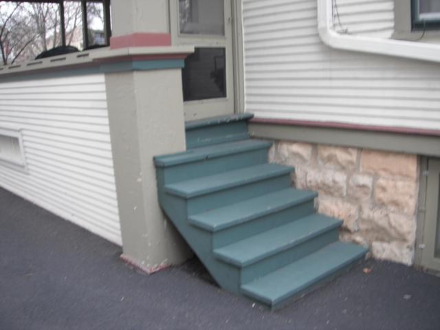 Exterior stairs with improper rises and runs and no railngs. This is safety hazard. "Oak Park Home Inspection" 