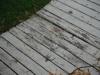 Rotted deck boards. New deck needs to be installed. Matteson Home Inspection"