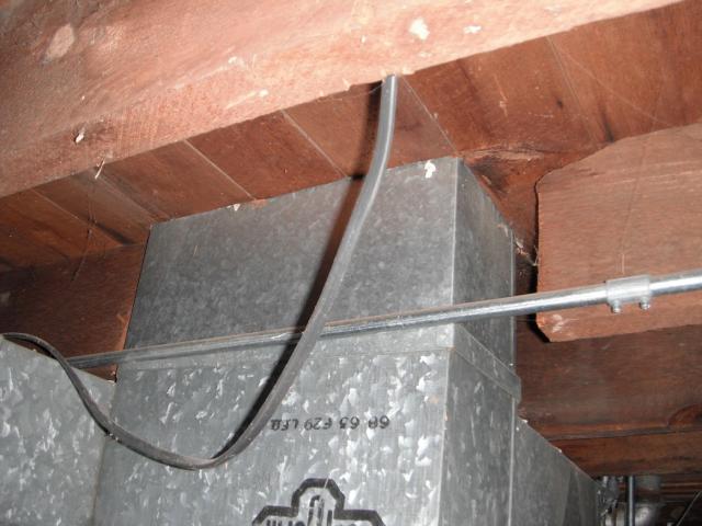 Cut off floor joists. Repair is needed. "Chicago Home Inspection Photo"