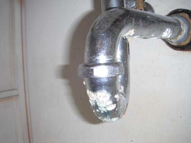 Corroded sink drain. "Matteson Home Inspection Photo"