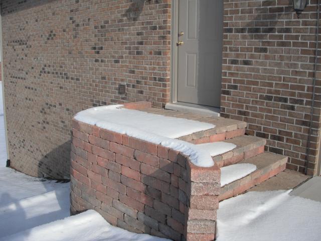Stairs and landing with no railings. ( Safety Hazard ) "Orland Park Home Inspection Photo"