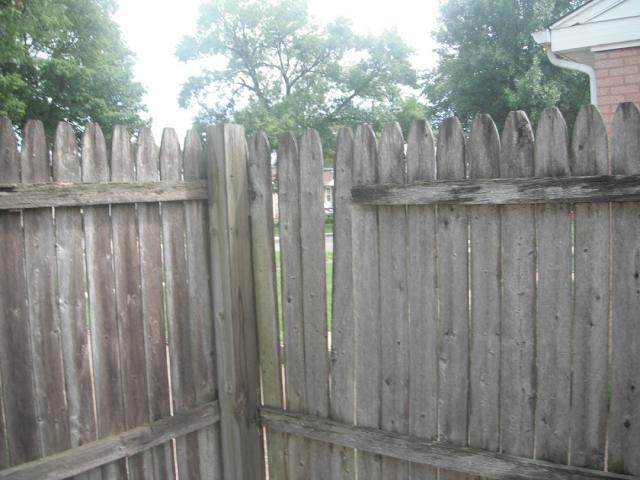 Old rotted wood fence. "Hickory Hills Home Inspection Photo"