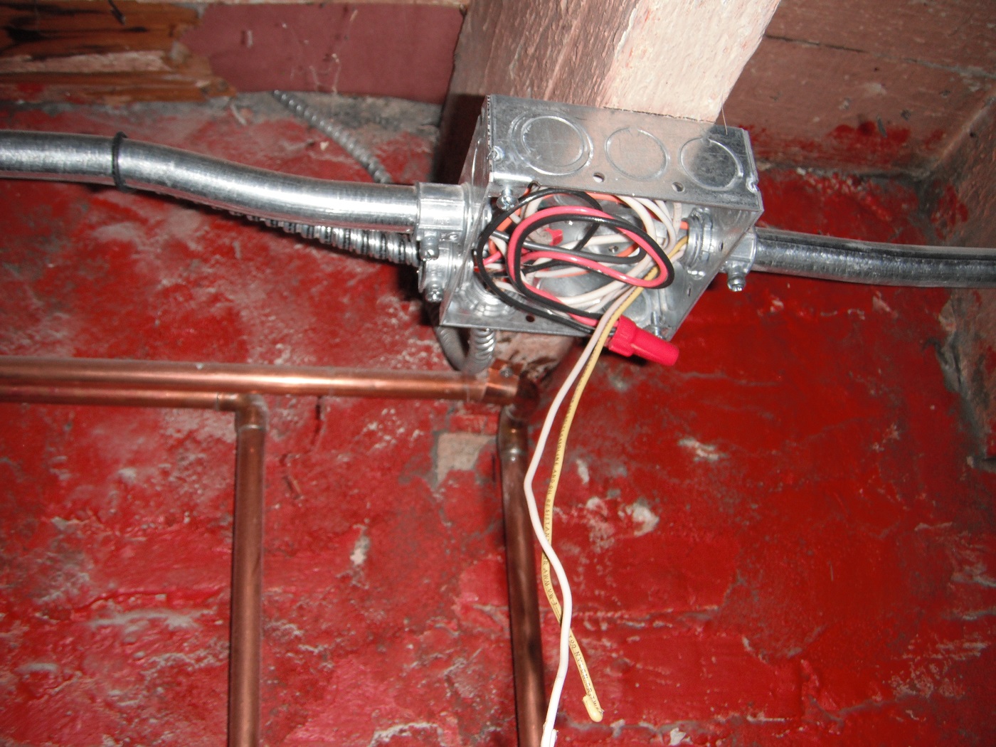 Live electrical wires sticking out of a electrical box. Major safe hazard. "Homer Glen Home Inspection Photo"