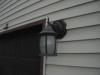 Exterior light fixture is missing a vinyl mounting block."Peotone Home Inspection Photo"