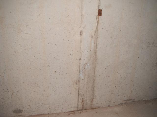 Crack on concrete foundation that gets seepage. "Brookfield Home Inspection Photo"