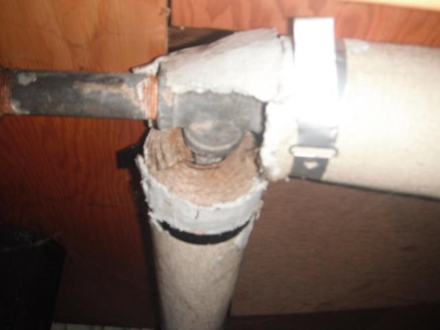 Probable asbestos. Health hazard a asbestos contractor is needed. "Palos Park Home Inspection Photos"