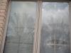 A cracked and defective thermopane seal window