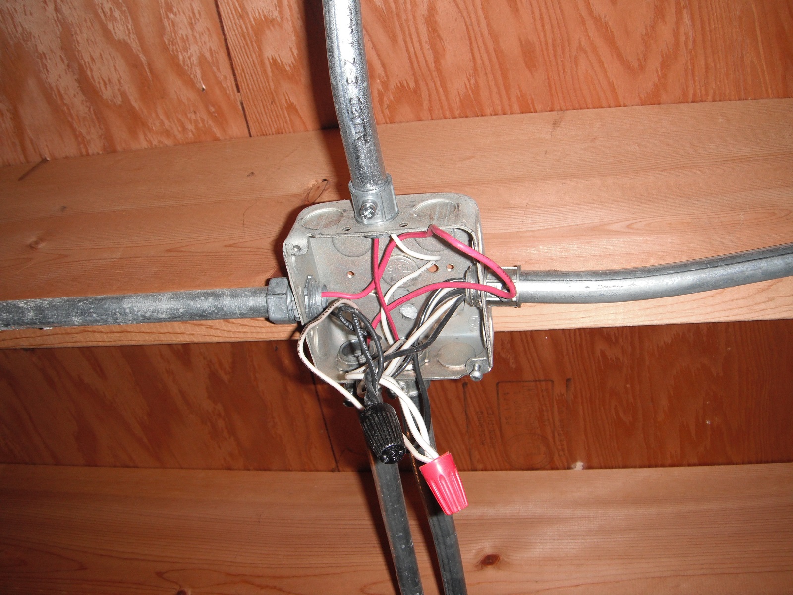 Open electrical junction box. (Safety Hazard)