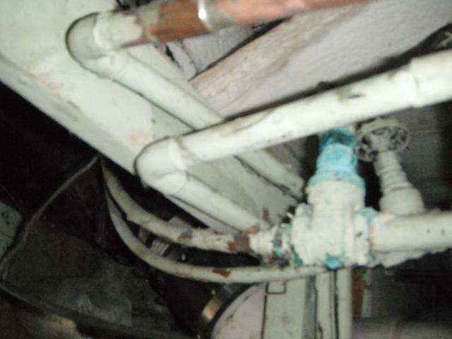 Major mineral build up on the water lines from a water leak. ( Worth Home Inspection Photo)