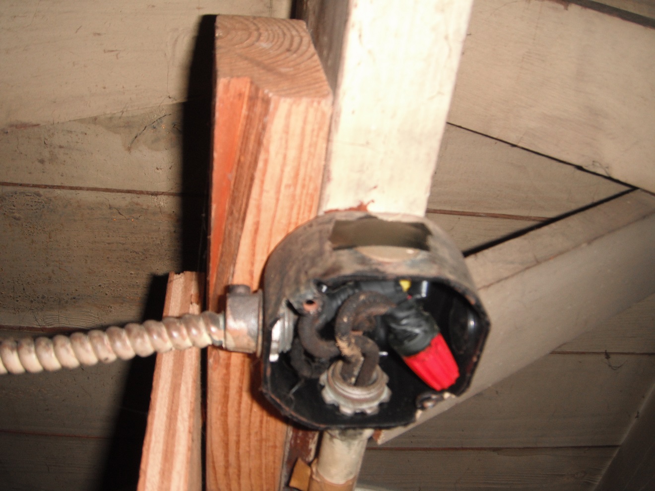 Old cloth covered wires with a open electrical junction box. "South Holland Home Inspector Photo"