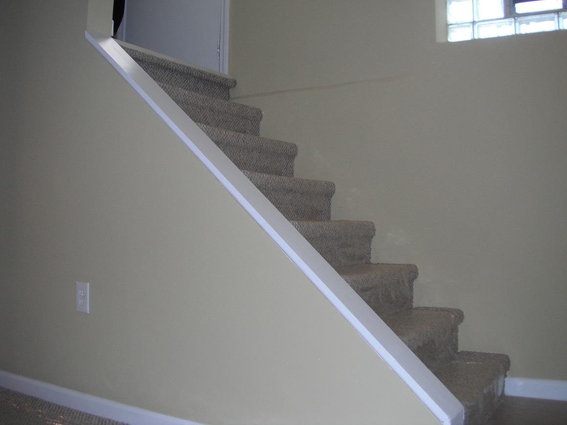 Unsafe stairs no railings installed. "Tinley Park Home Inspection Photo"