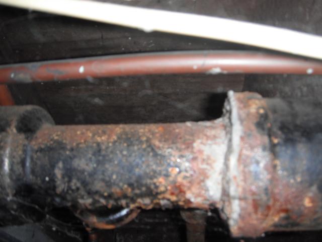 Very Corroded cast iron waste line. (Lockport Home inspection Photo)