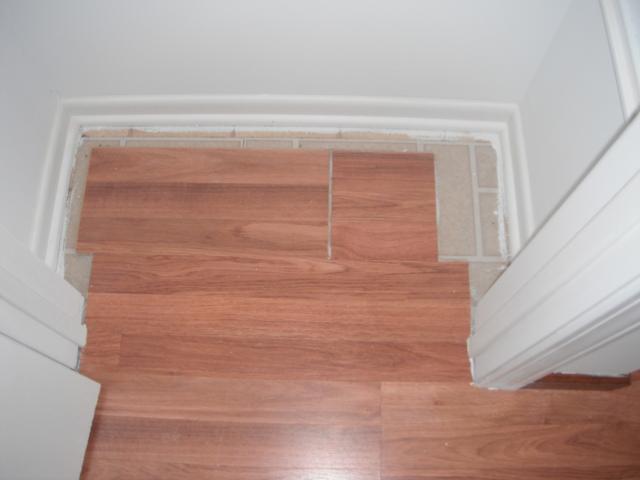 Unfinshed laminate flooring in the closet. "Oak Lawn Home Inspection"