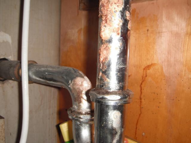 The sink drian and trap have major corrsion and leak. Needs replacing. "Plainfield Home Inspector Photos"
