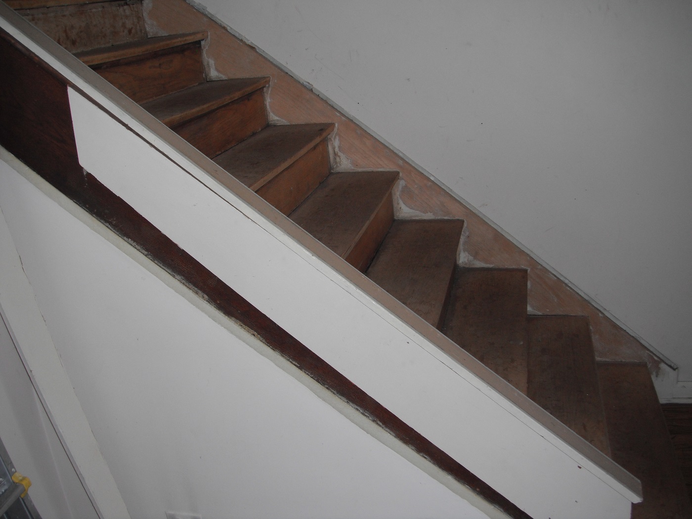 The stairs are missing railngs and a hand rail. "Berwyn Home Inspection"