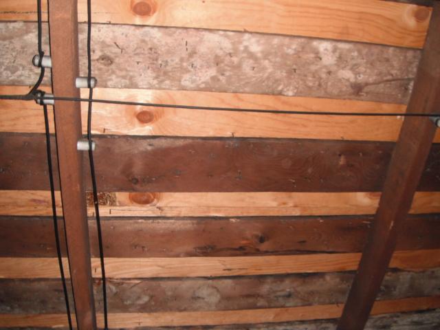 Old Knob And tube wiring in the attic. Possible safety hazard.  "River Forest Home Inspection Photo"
