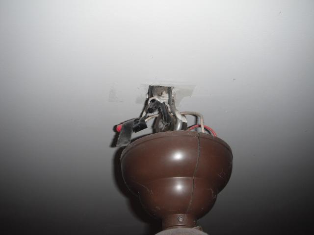 The ceilng fan and elelectrcity is installed extremly poor. Very unsafe. "New Lenox Home Inspection Photo"