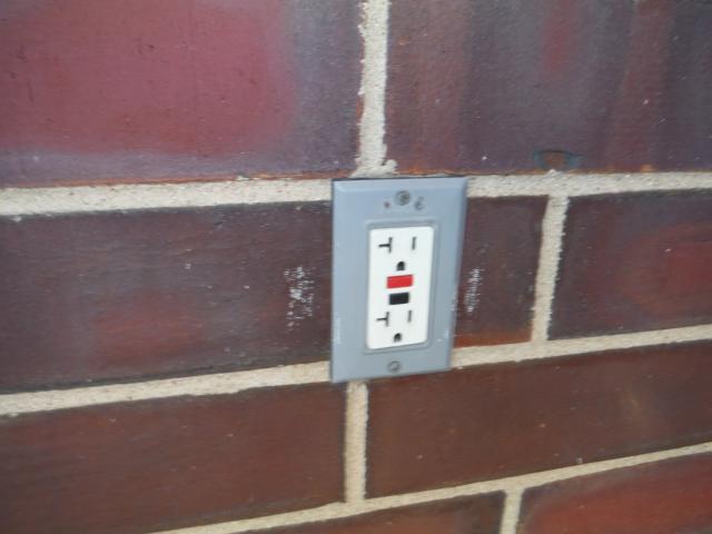 GFCI outlet is defective it doesnt trip and its missing a cover plate. Frankfort Home Inspector